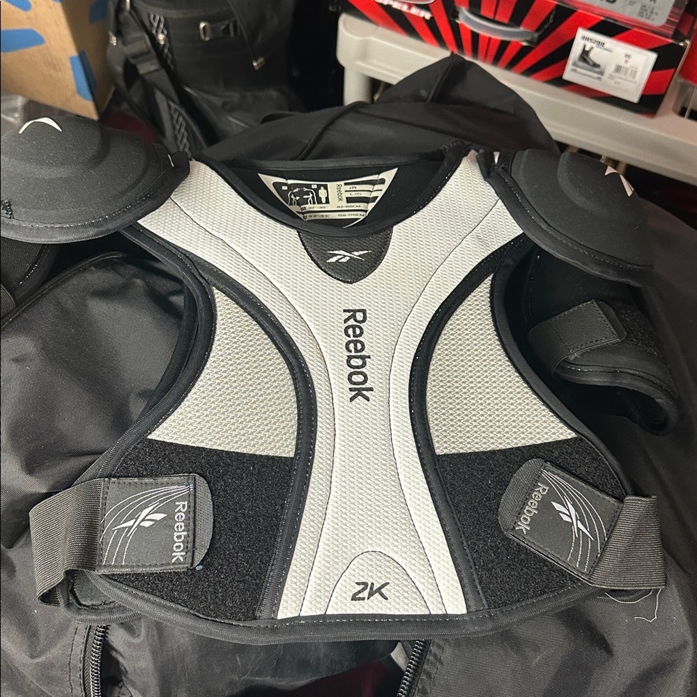 Reebok Black and Gray hockey chest protector jr large